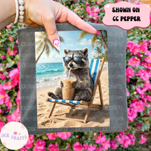 Load image into Gallery viewer, Raccoon Drinking Coffee On The Beach
